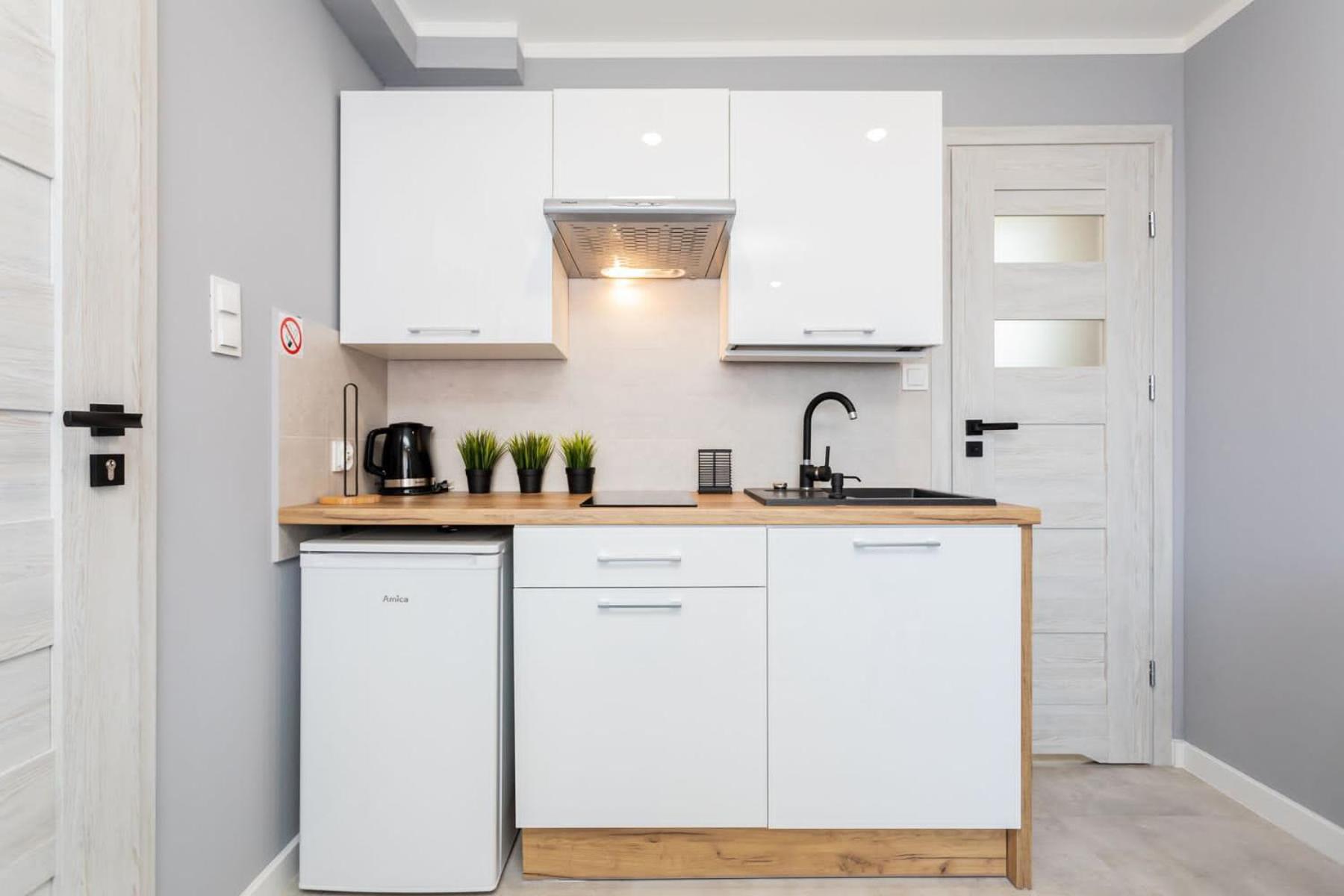 Rybacka 48 - Twoje miejsce wypoczynku, domki, studia, rowery, hulajnogi, e-foil, balie z hydromasażem, sprzęt do poławiania bursztynu