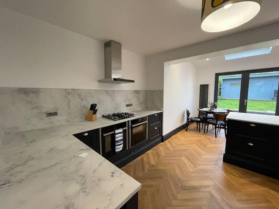 Cheerful 2 bed house on Causeway Coastal Route with parking