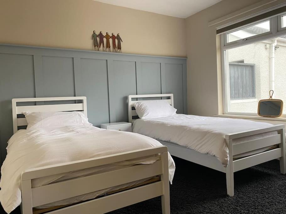 Modern holiday home with sea view & BBQ hut- close to beach