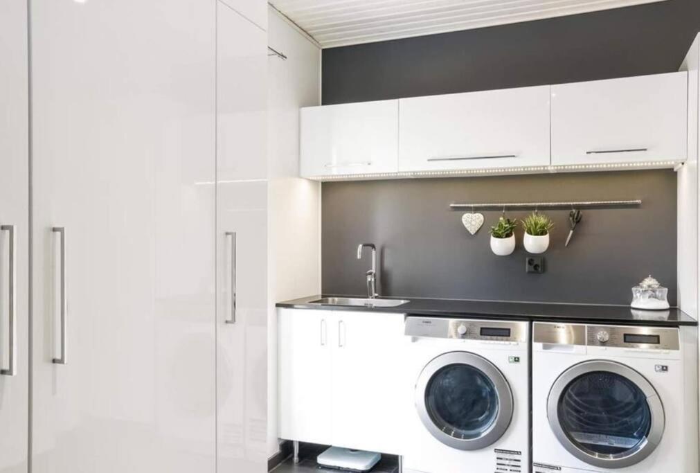 Hienoa talo porealtaalla lähellä Helsinkiä ja lentokenttää