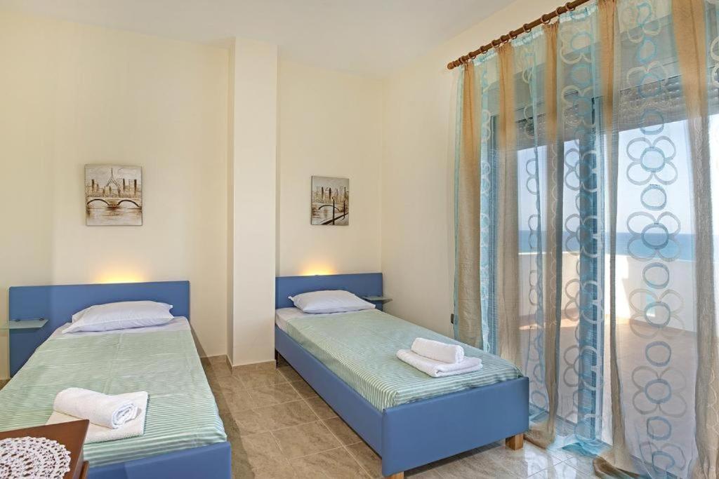 Pearl Villas Apolakkia - Beach Front Villas with Private Pool