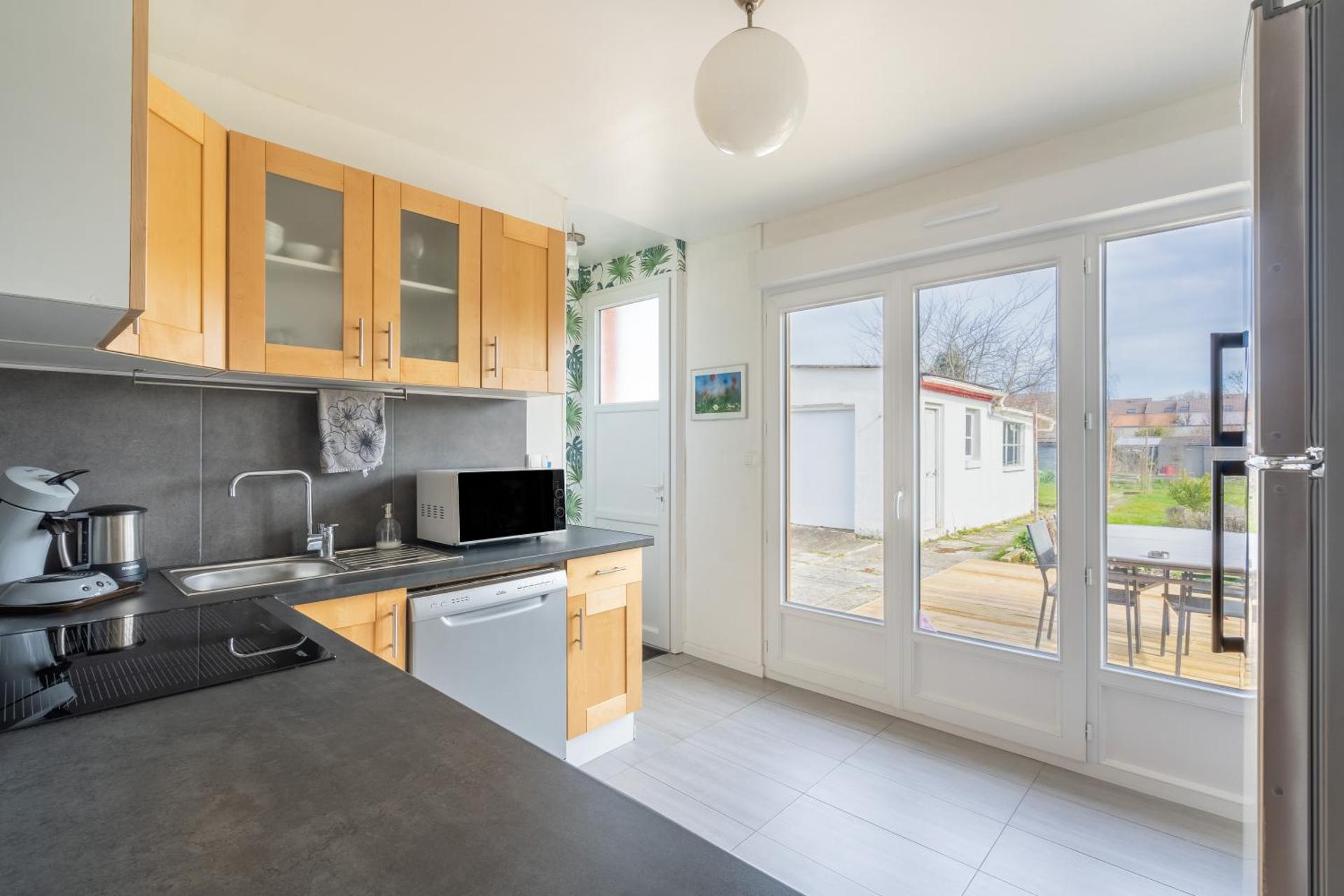 Maison confortable, terrasse et jardin à Amiens