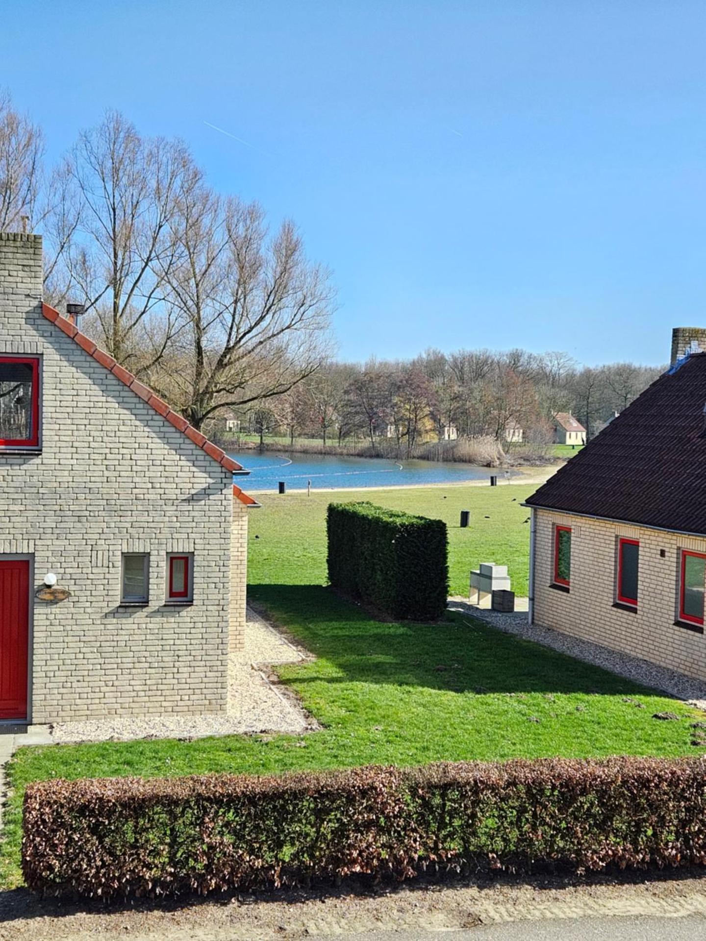 7 person House with garden, firepit, swimming lake, hammock, child friendly, in- and outside playground, slide, and great coffee