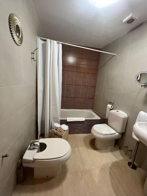 Apartamento a pie de playa con vistas al mar.