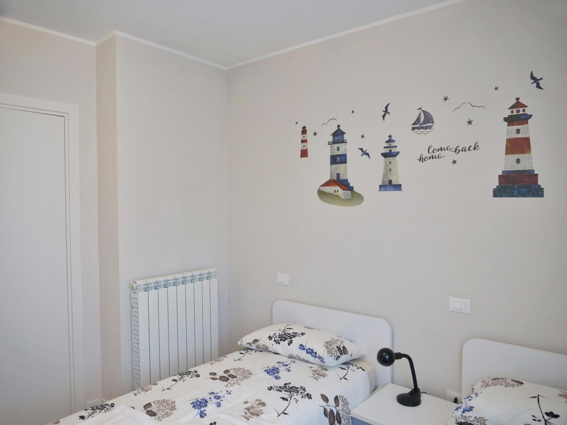 FARO DELL'ESTATE delizioso BICAMERA con POSTO AUTO dietro la SPIAGGIA