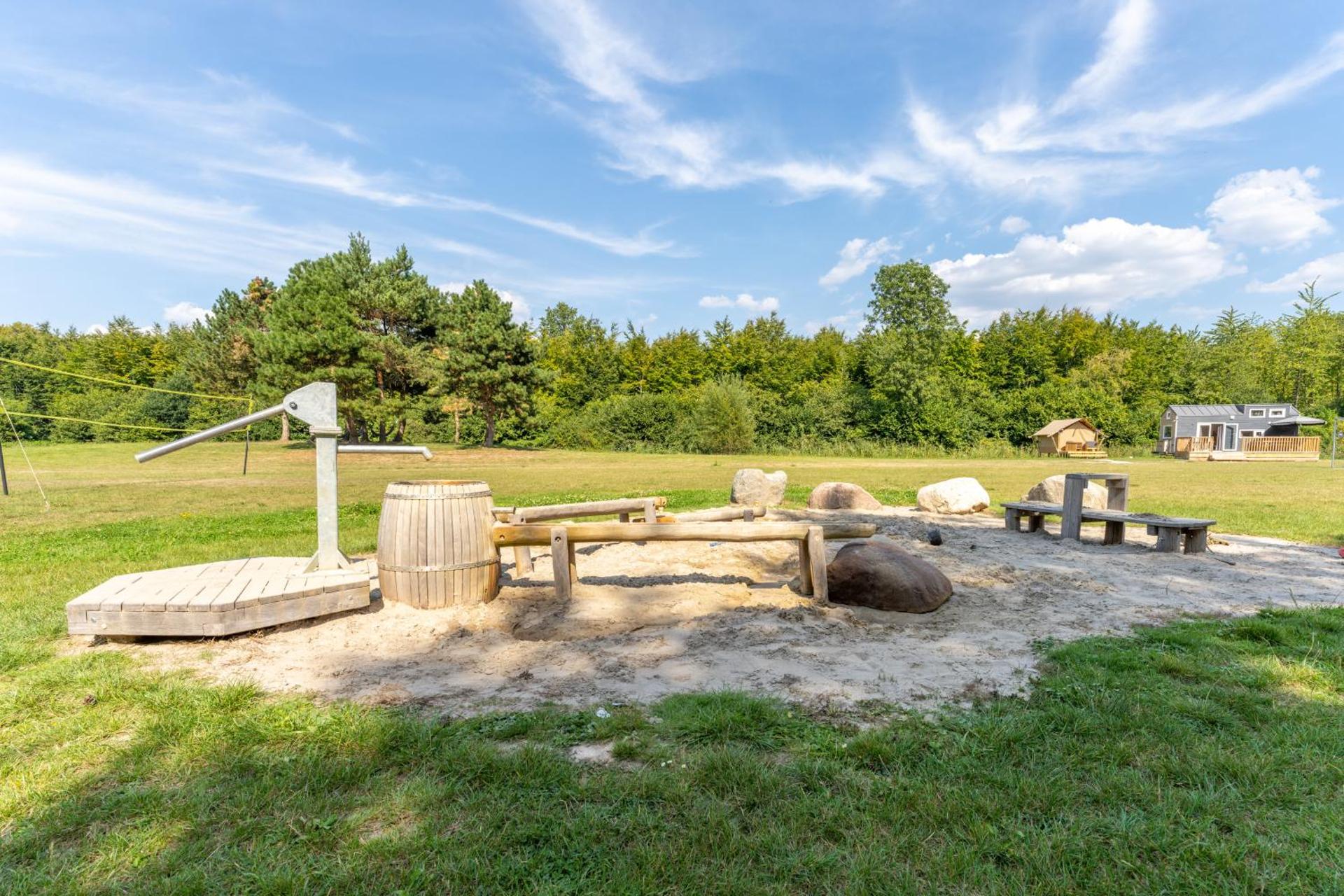 Green Tiny House with shared pool