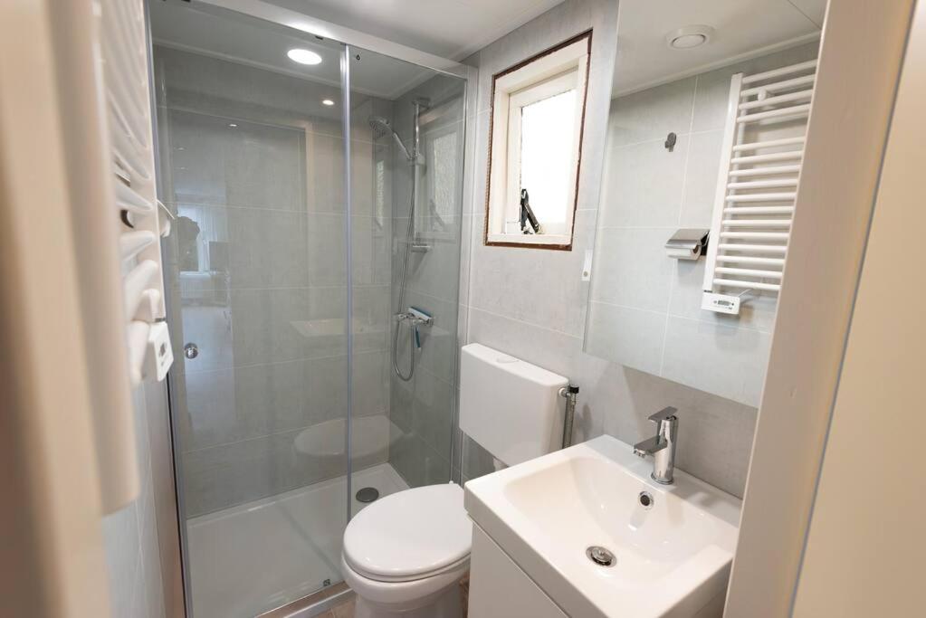 Knus huisje op kindvriendelijk park met zwembad