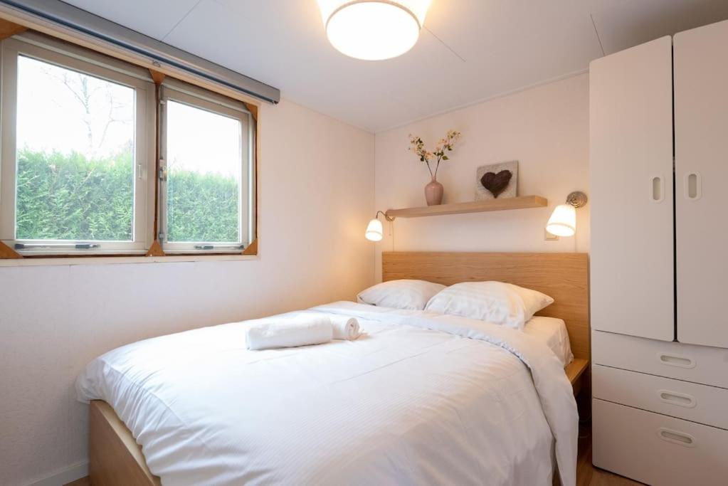 Knus huisje op kindvriendelijk park met zwembad