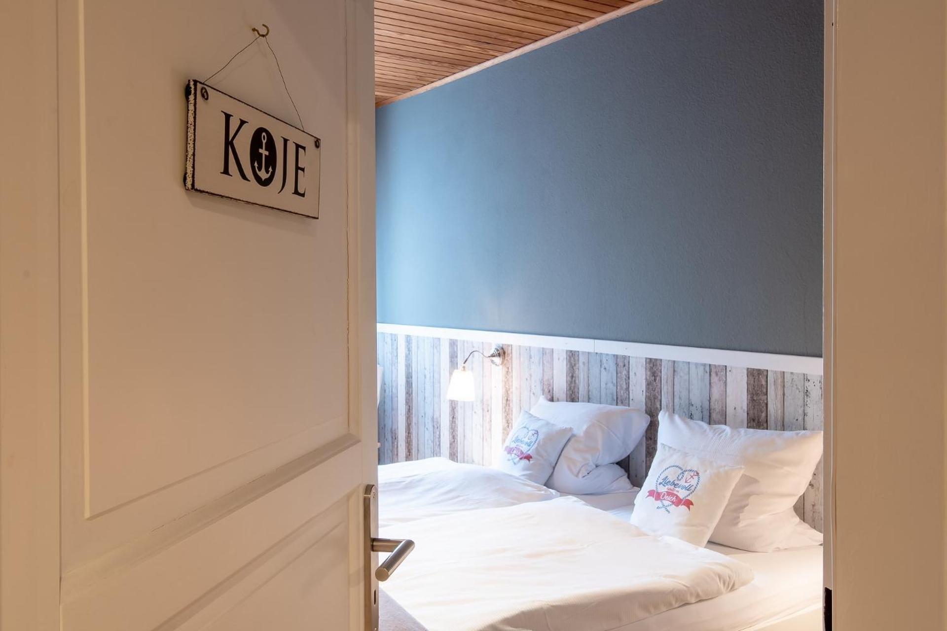 Liebevoll hinterm Deich - Ferienwohnungen