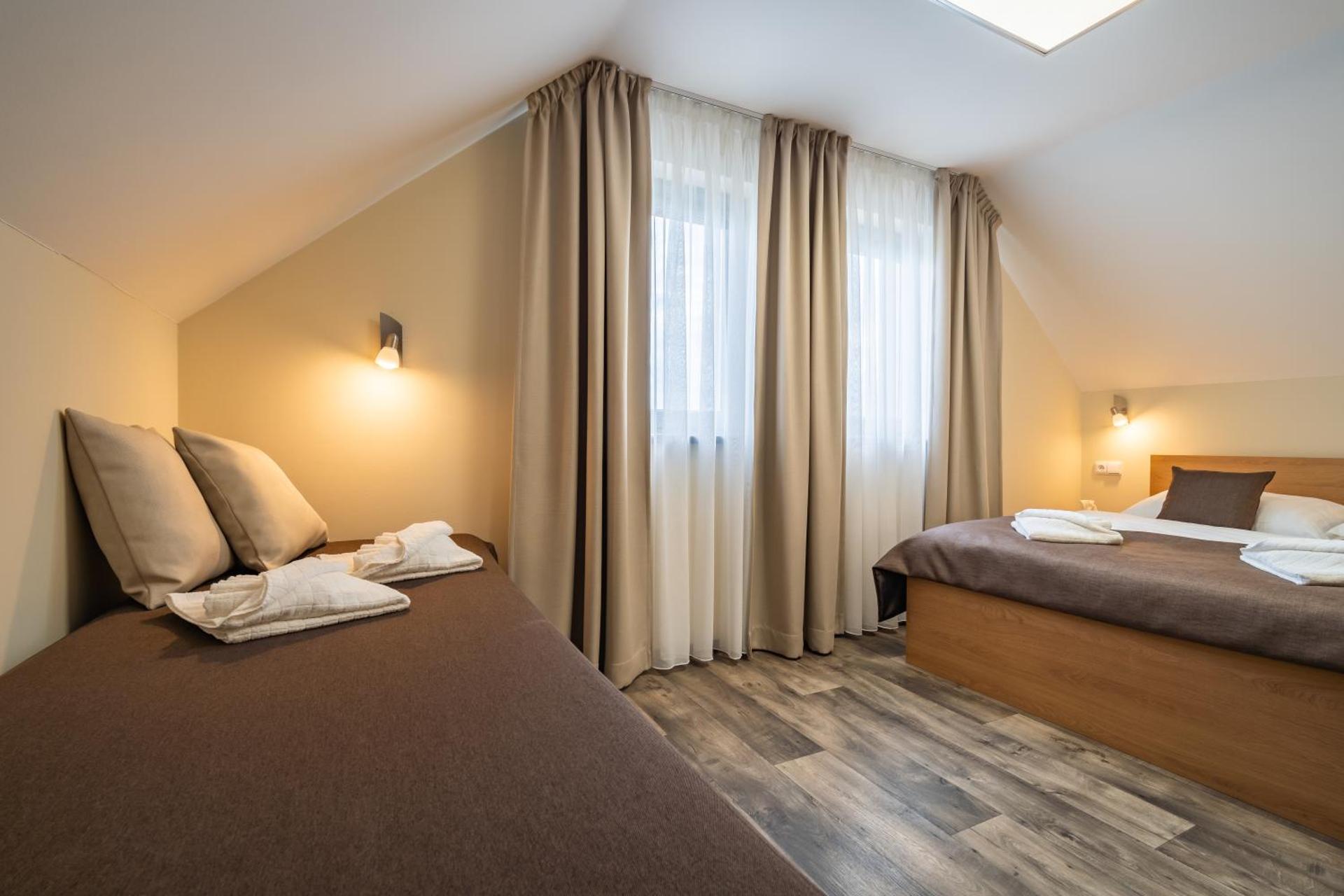 Vinoza - ubytování a vinný sklep Velké Bílovice Pod Vinicí