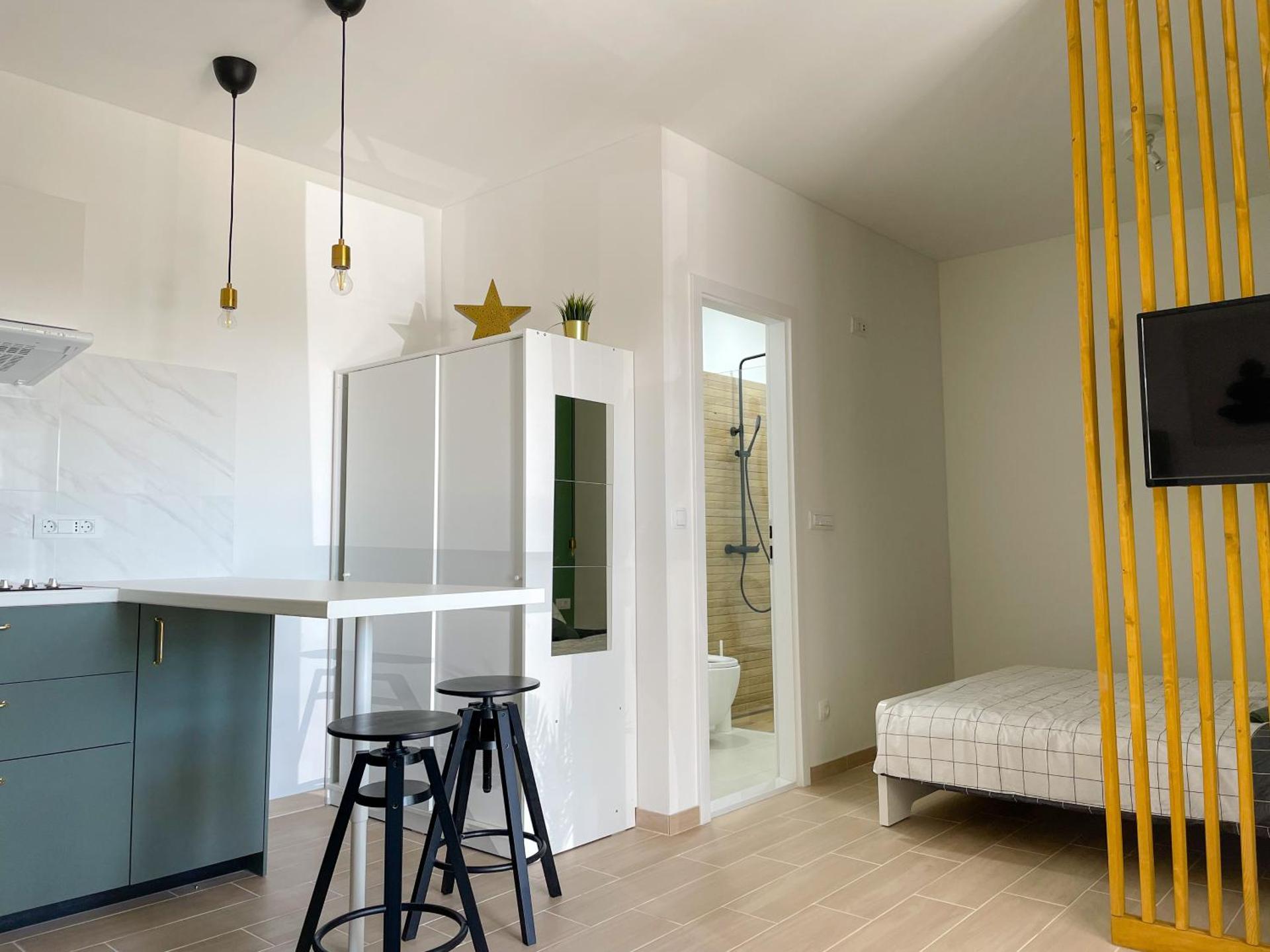 Modern studio overlooking downtown