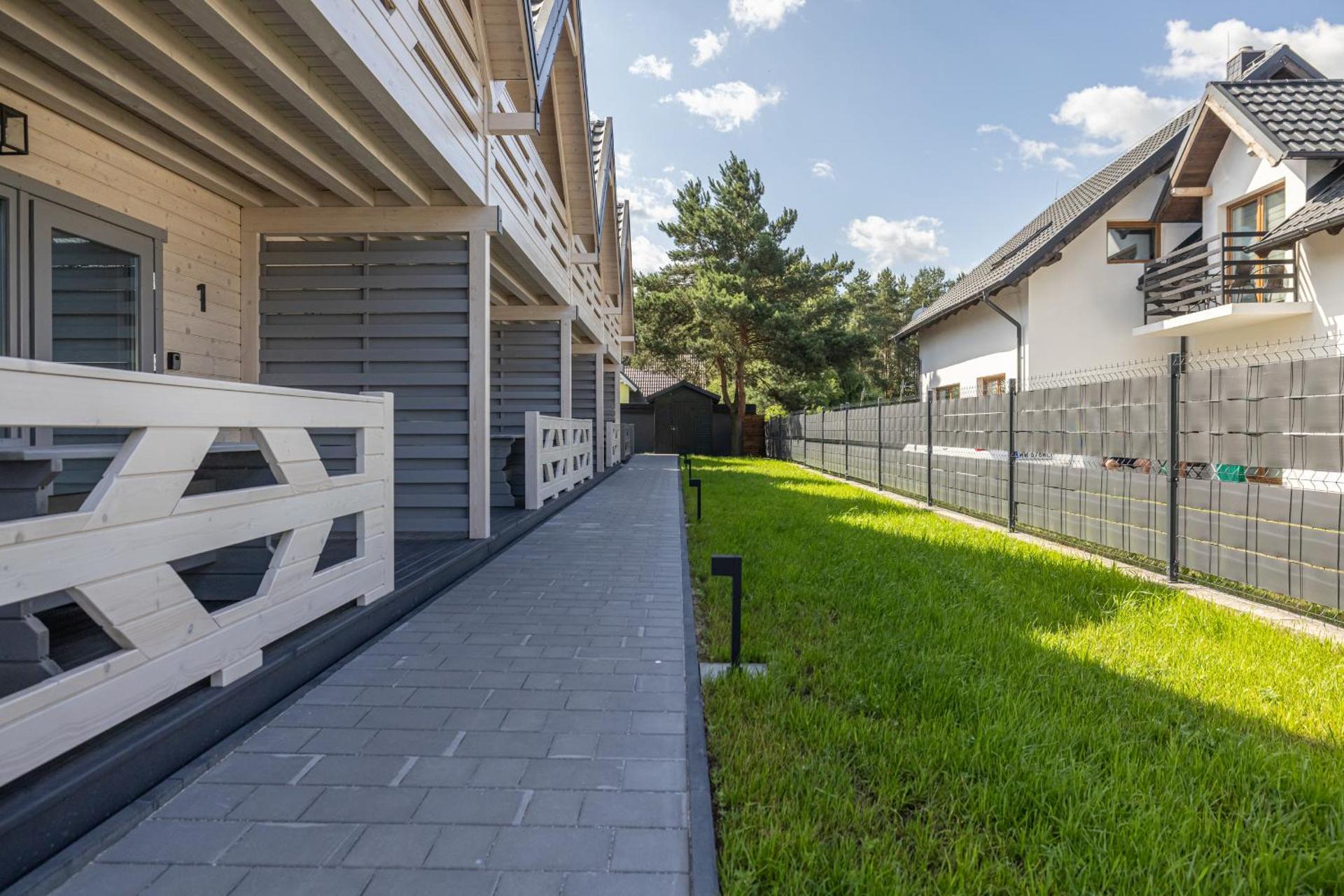 Natura Jantar - Całoroczne domy drewniane, rowery, hulajnogi, e-foil, balie z hydromasażem, sprzęt do poławiania bursztynu