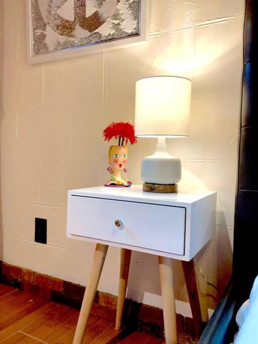 Live in this iconic East Side lower level unit