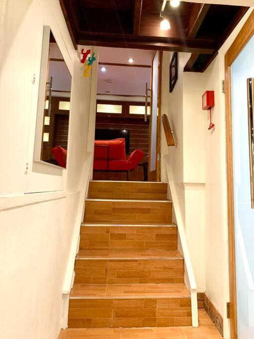 Live in this iconic East Side lower level unit