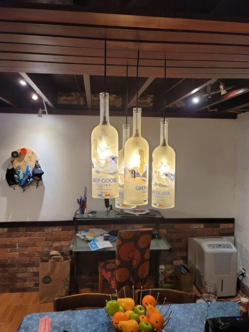 Live in this iconic East Side lower level unit