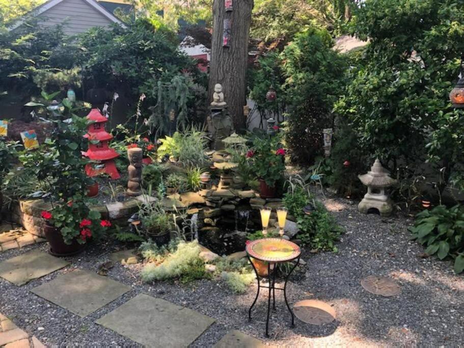 Live in this iconic East Side lower level unit