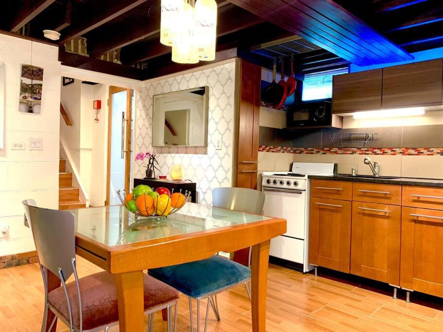 Live in this iconic East Side lower level unit