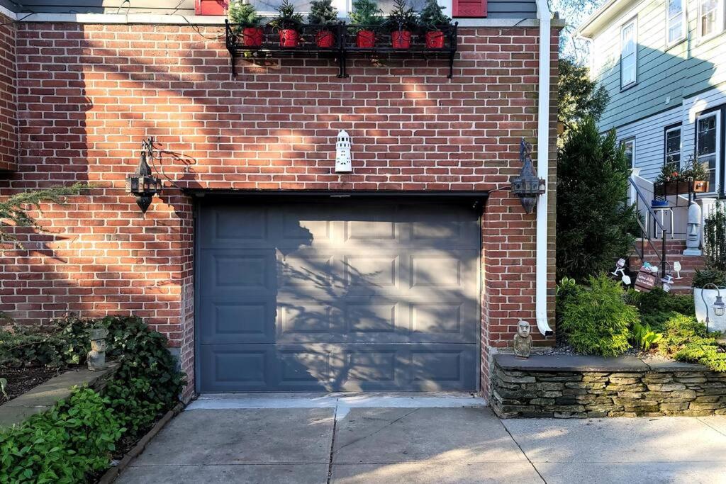 Live in this iconic East Side lower level unit