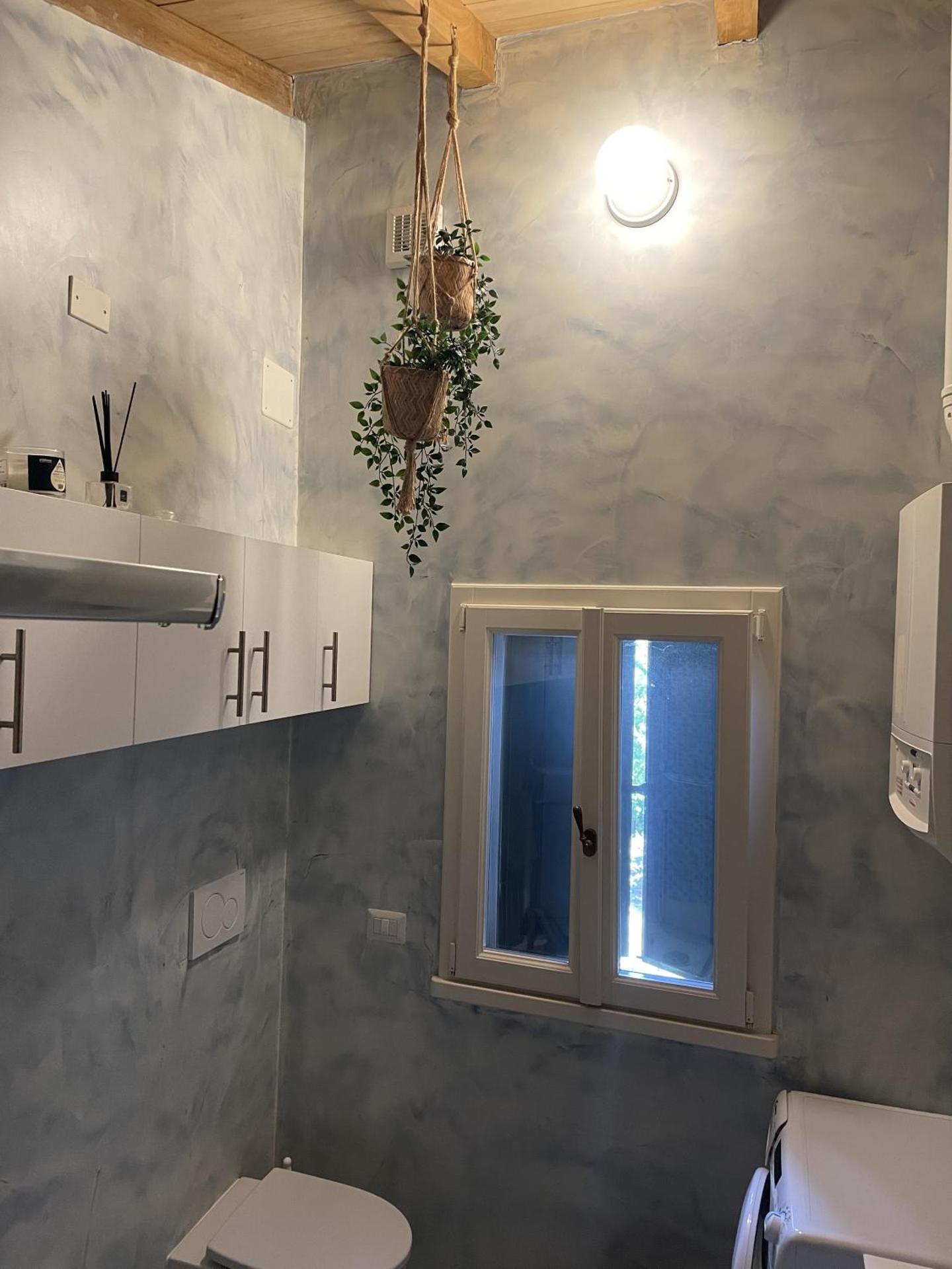 Alloggio con camino nel borgo del castello