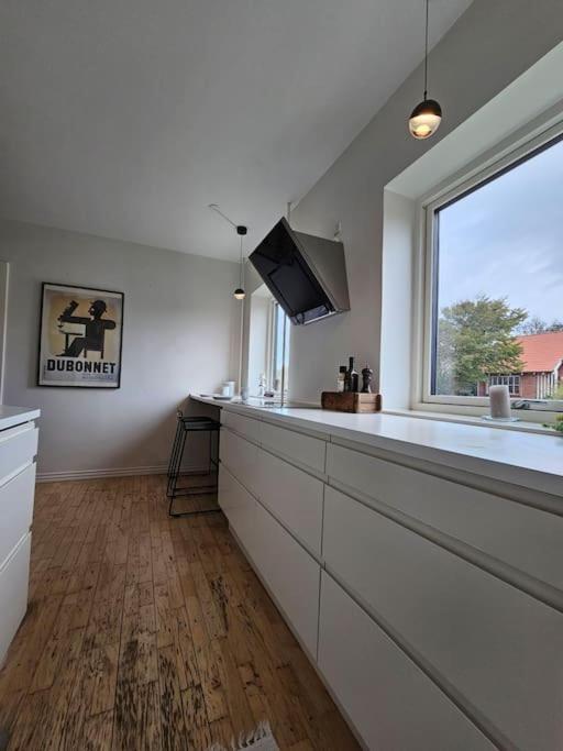 Lejlighed med altan og gratis parkering