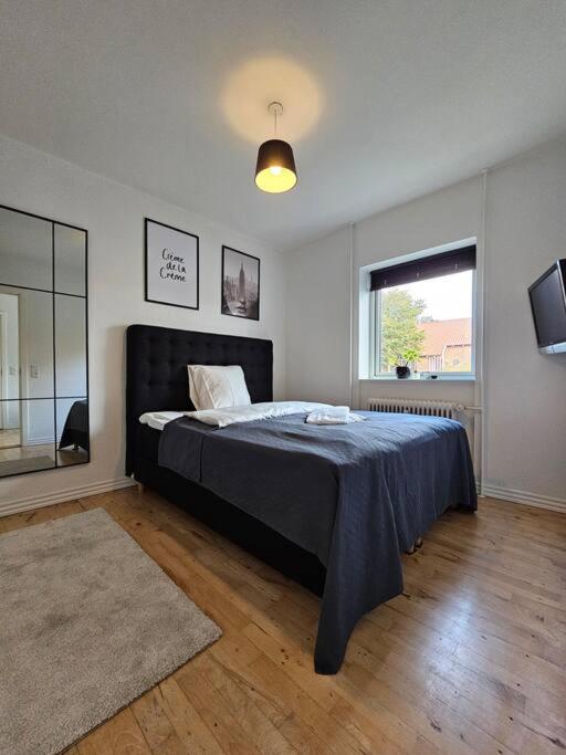 Lejlighed med altan og gratis parkering