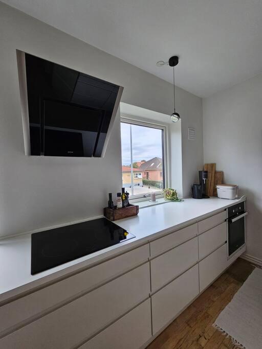 Lejlighed med altan og gratis parkering