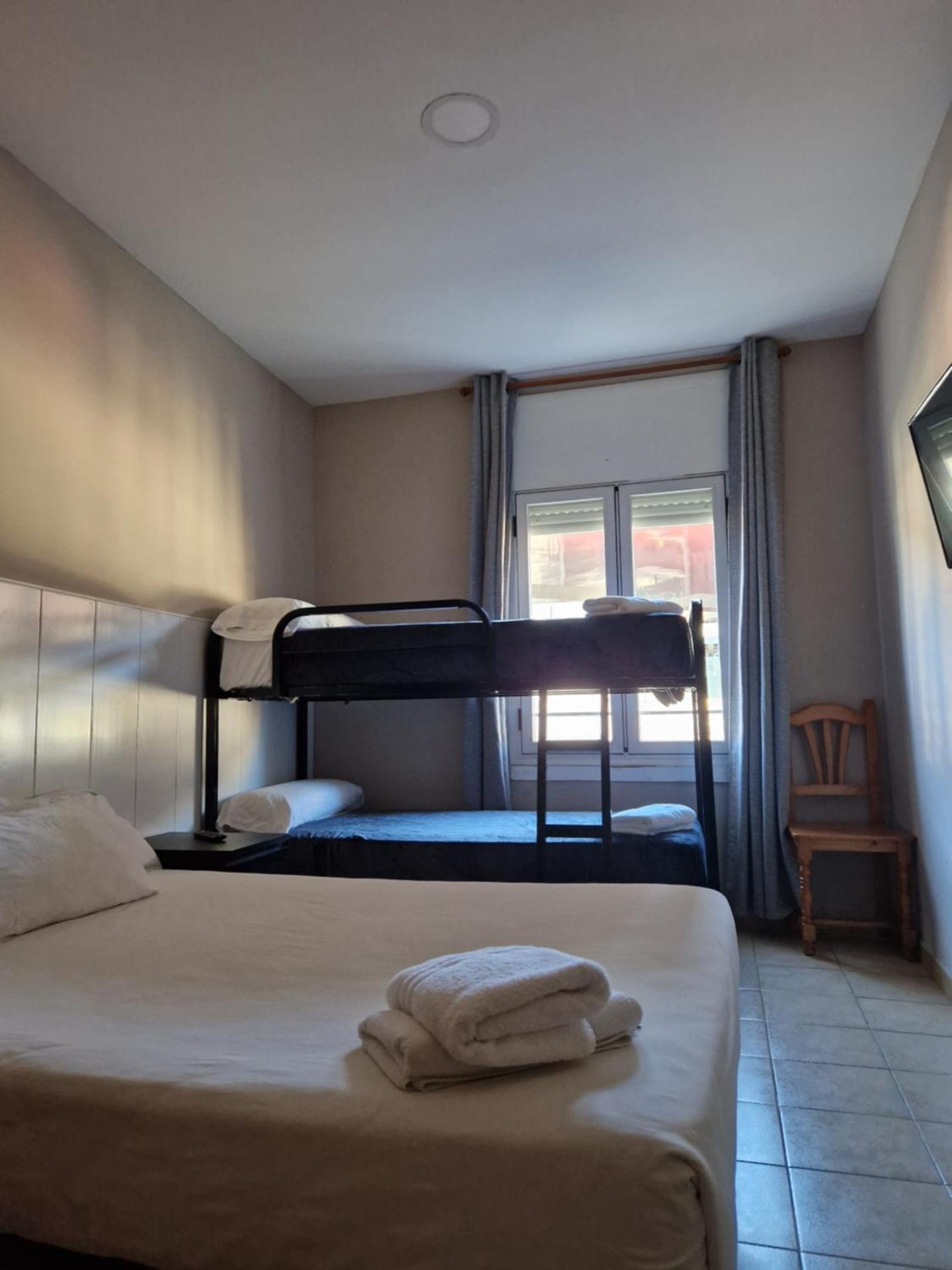 Quadruple Room with Private Bathroom