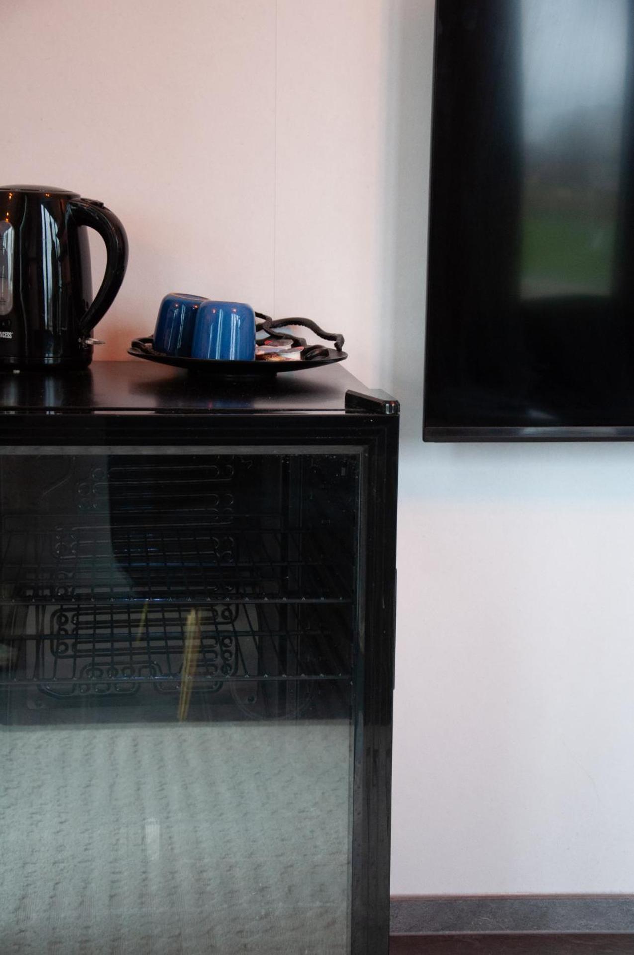 Kamer met Kingsize Bed en Uitzicht op Meer