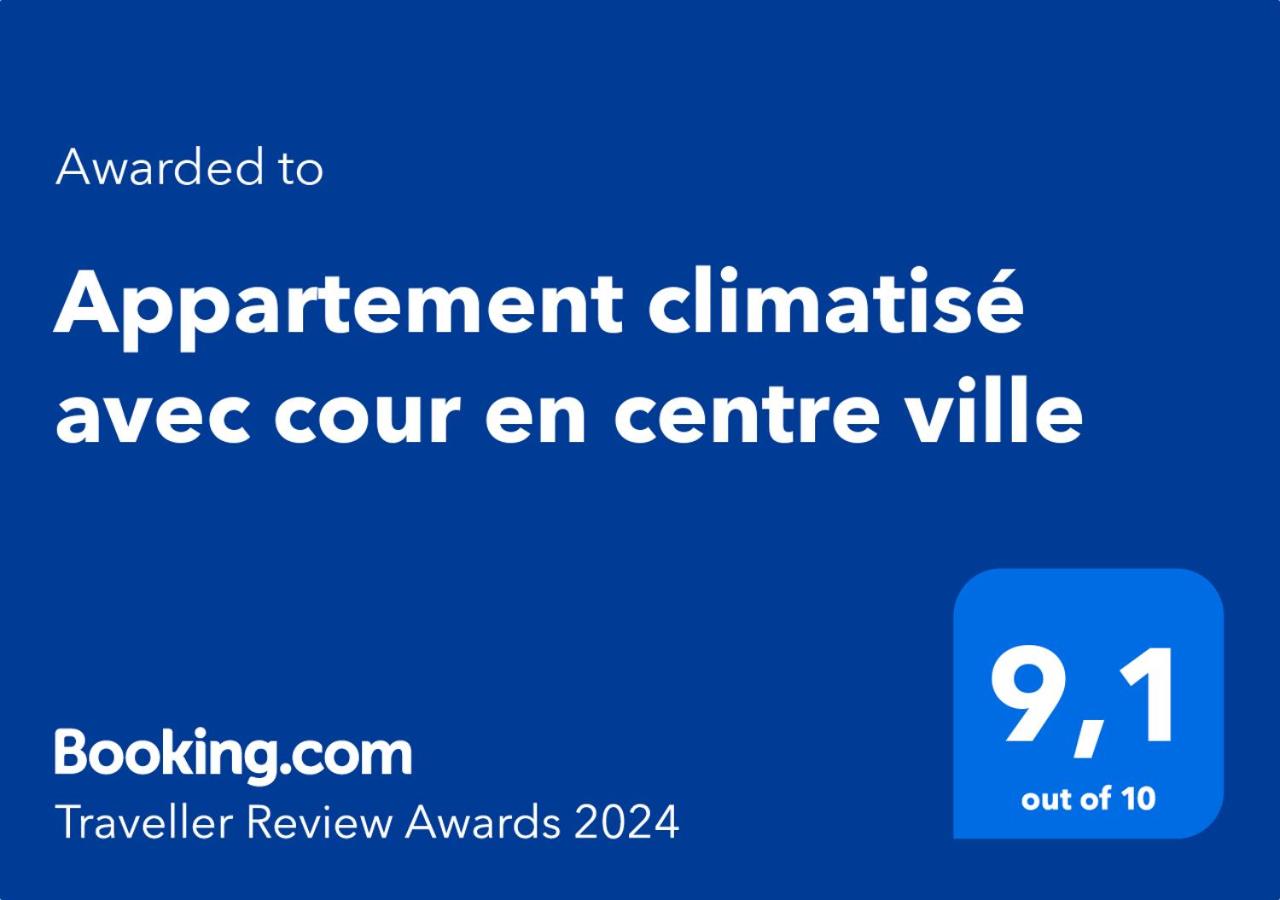 Appartement climatisé avec cour en centre ville