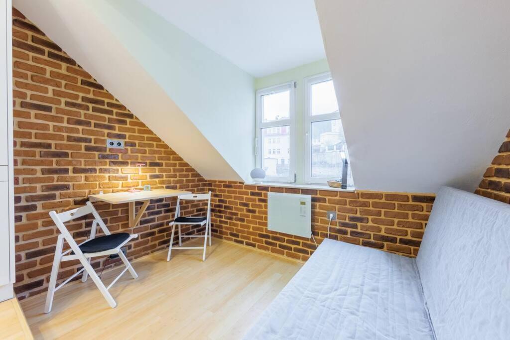 Věžička u Vřídla (Tower apartment in centre)