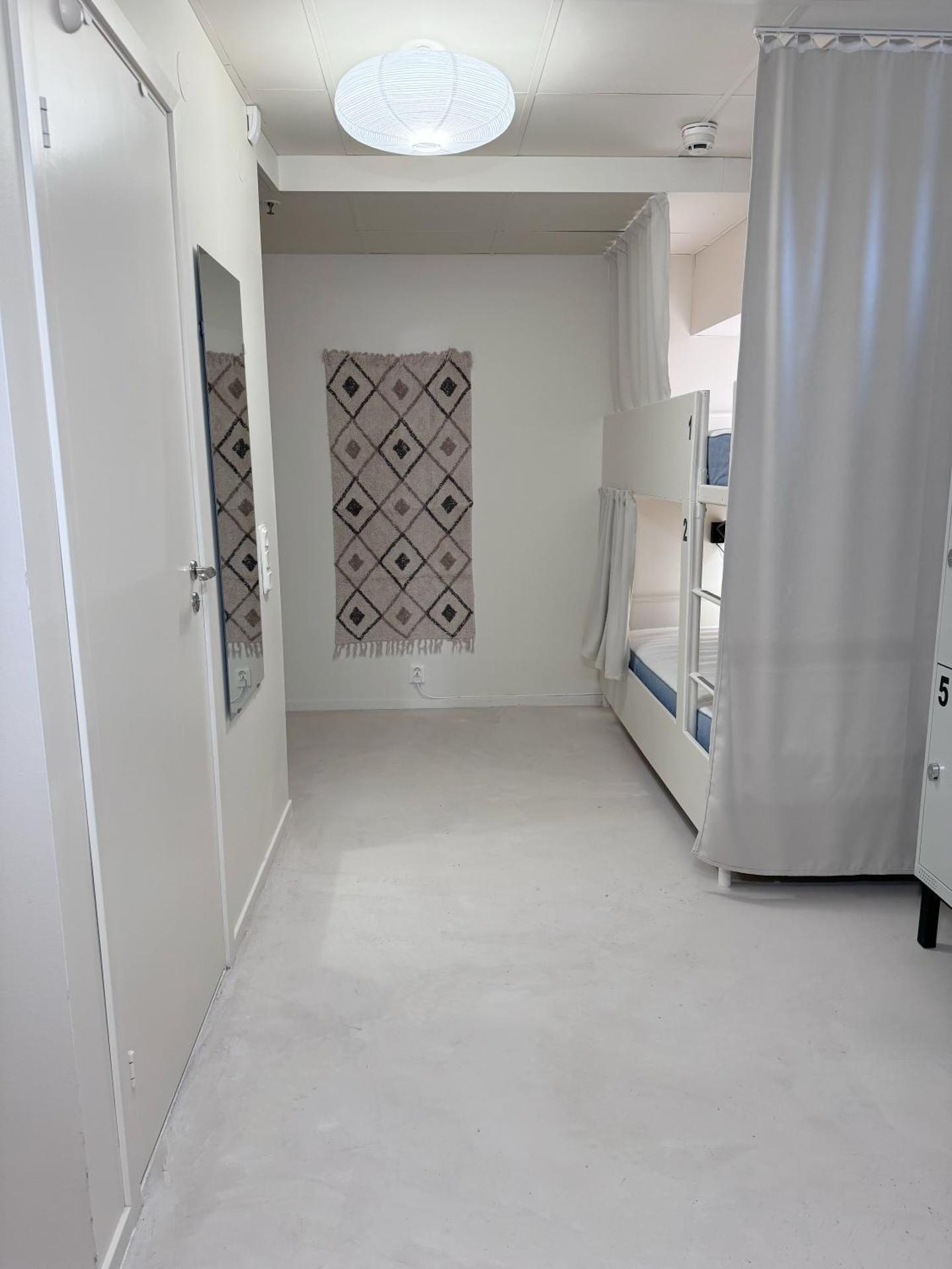 Cama en habitación compartida mixta de 8 camas