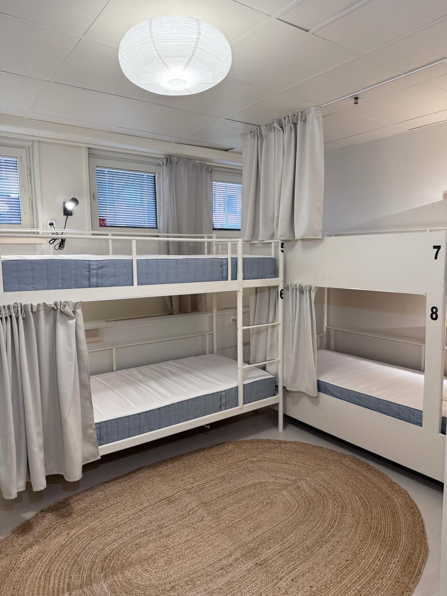 Cama en habitación compartida mixta de 8 camas