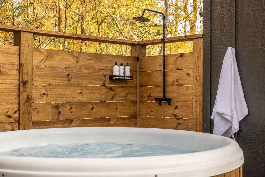 Glamping cottage with glass front and hot tub!