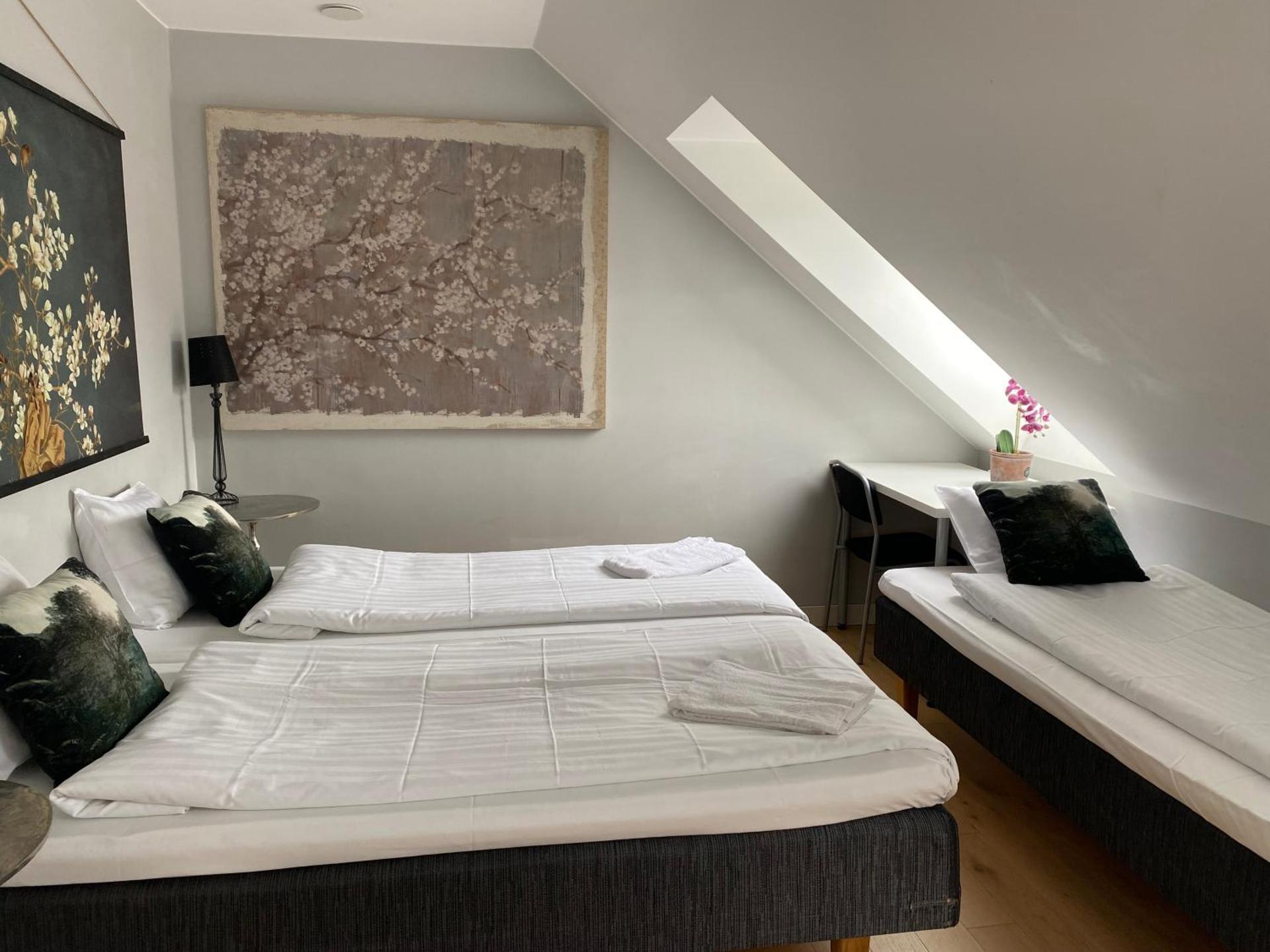 4-personersværelse med fælles badeværelse