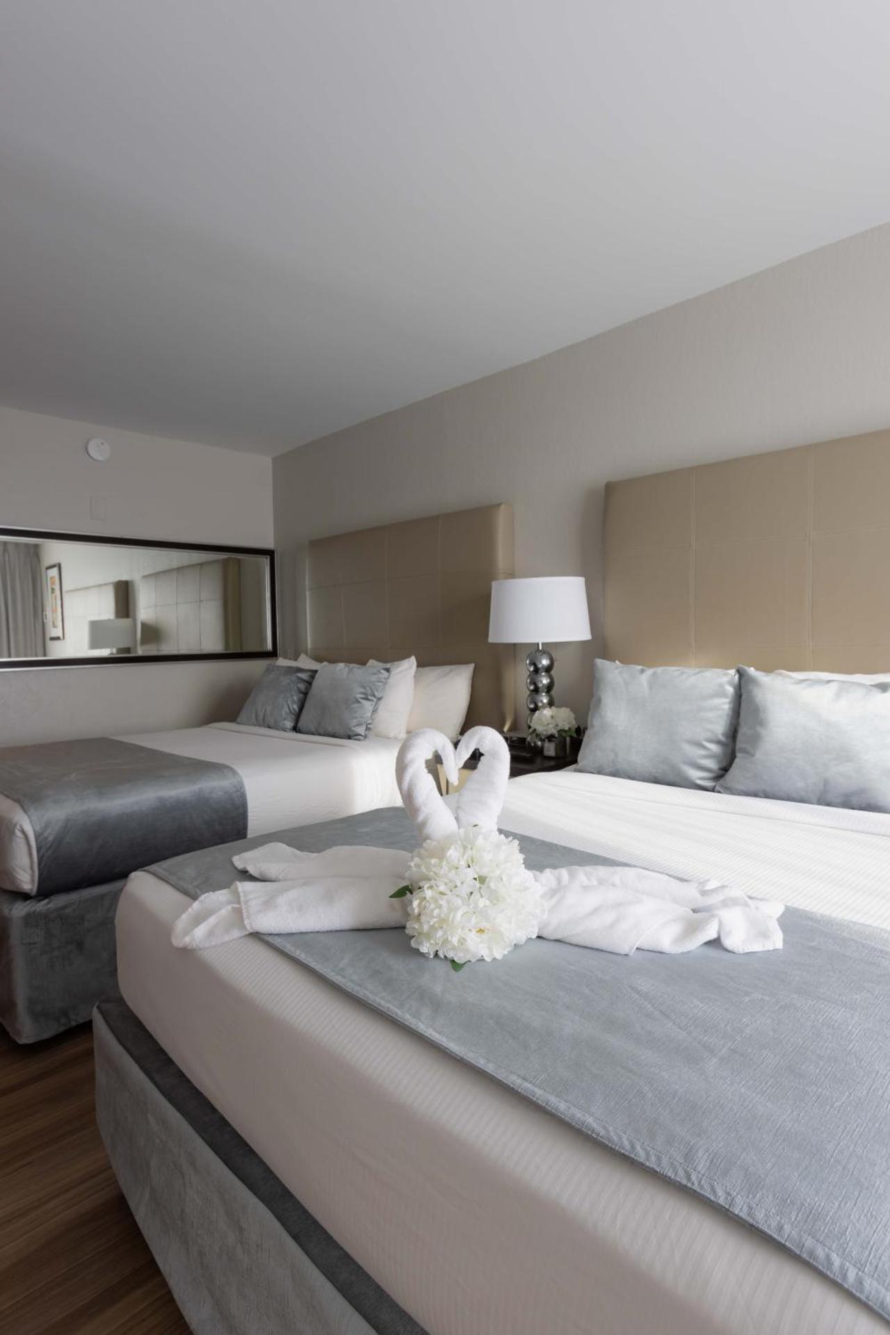 Queen Room with Two Queen Beds and Playground View - Non-Smoking