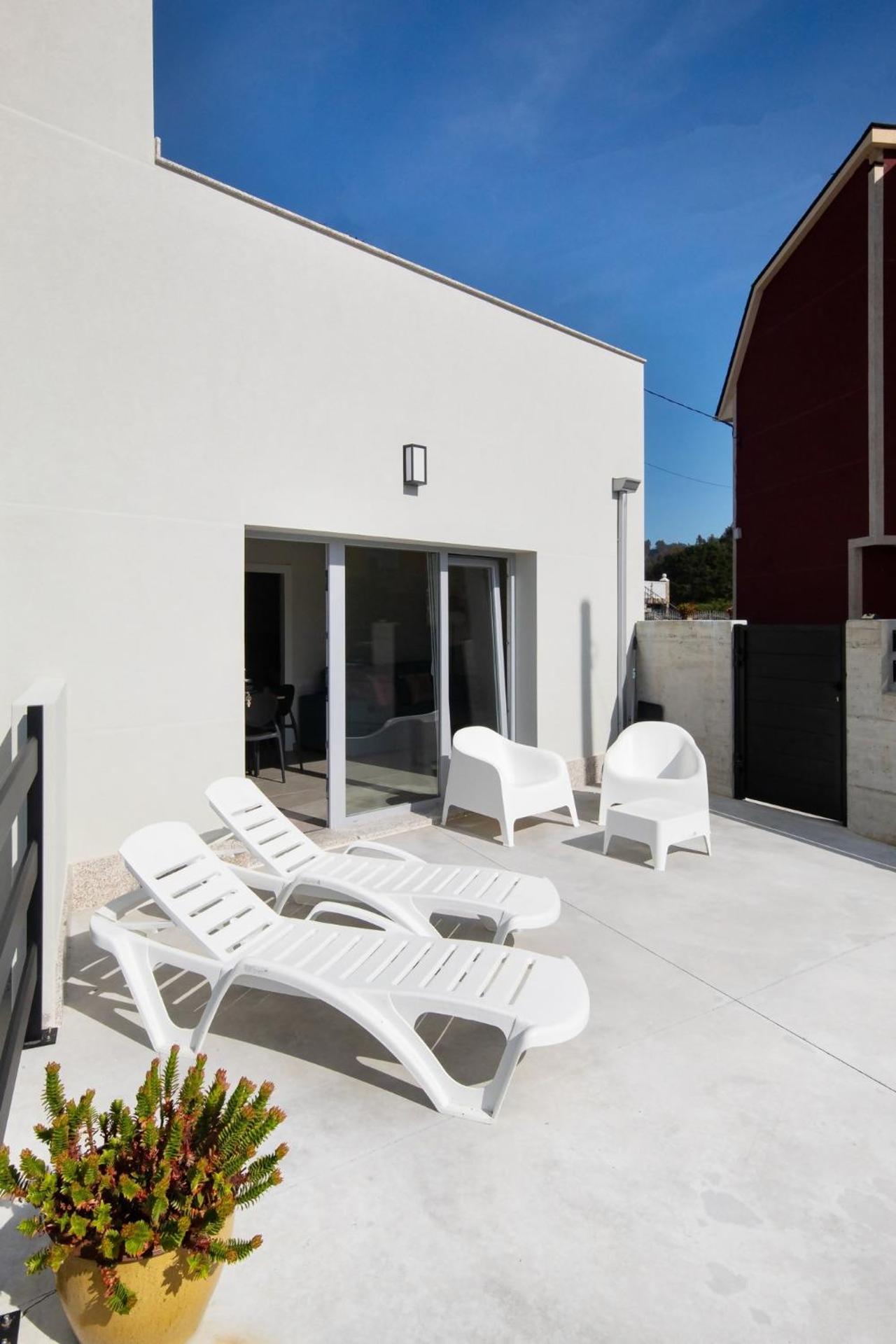 AG Casa do Ramon en Playa Razo con patio exterior