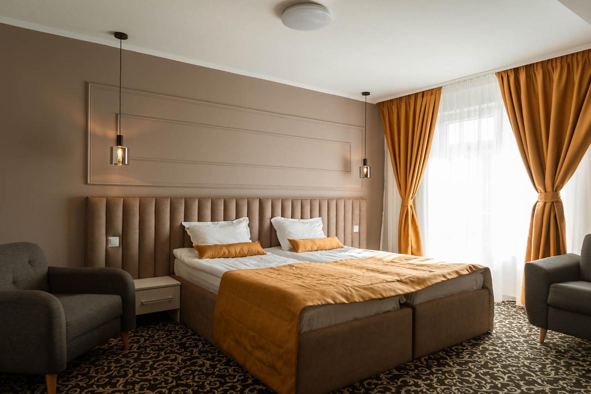 Doppel- oder Zweibettzimmer