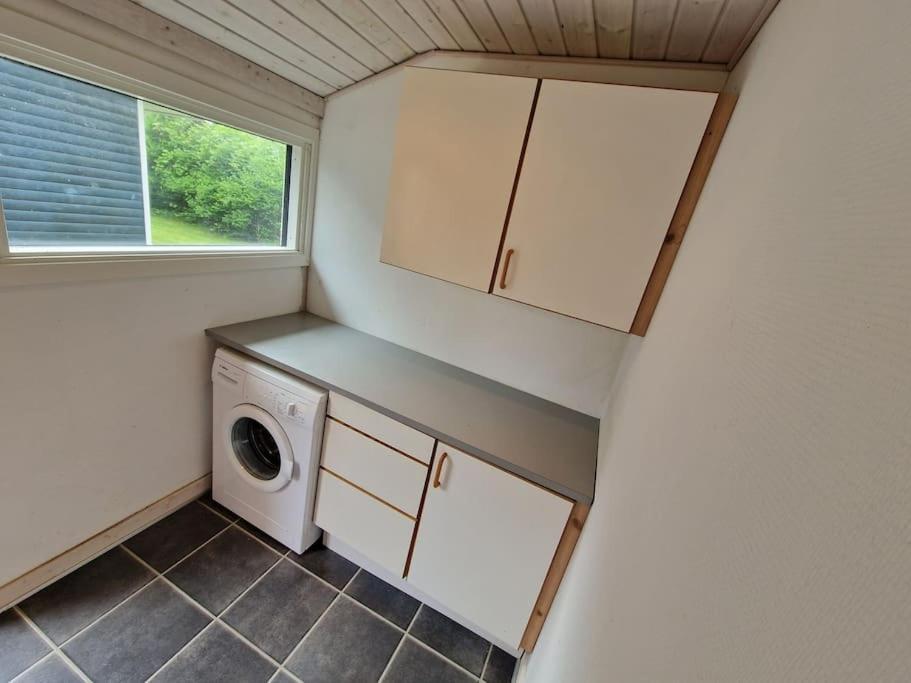 Holiday house by a fantastic beach and free WiFi