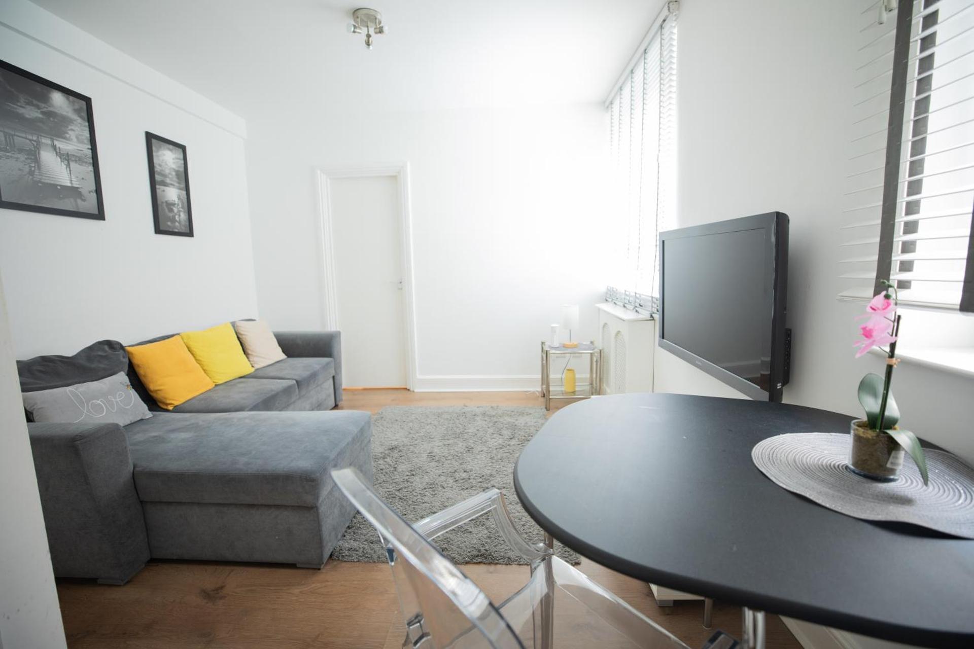 One bedroom at Chelsea cloister Hotel