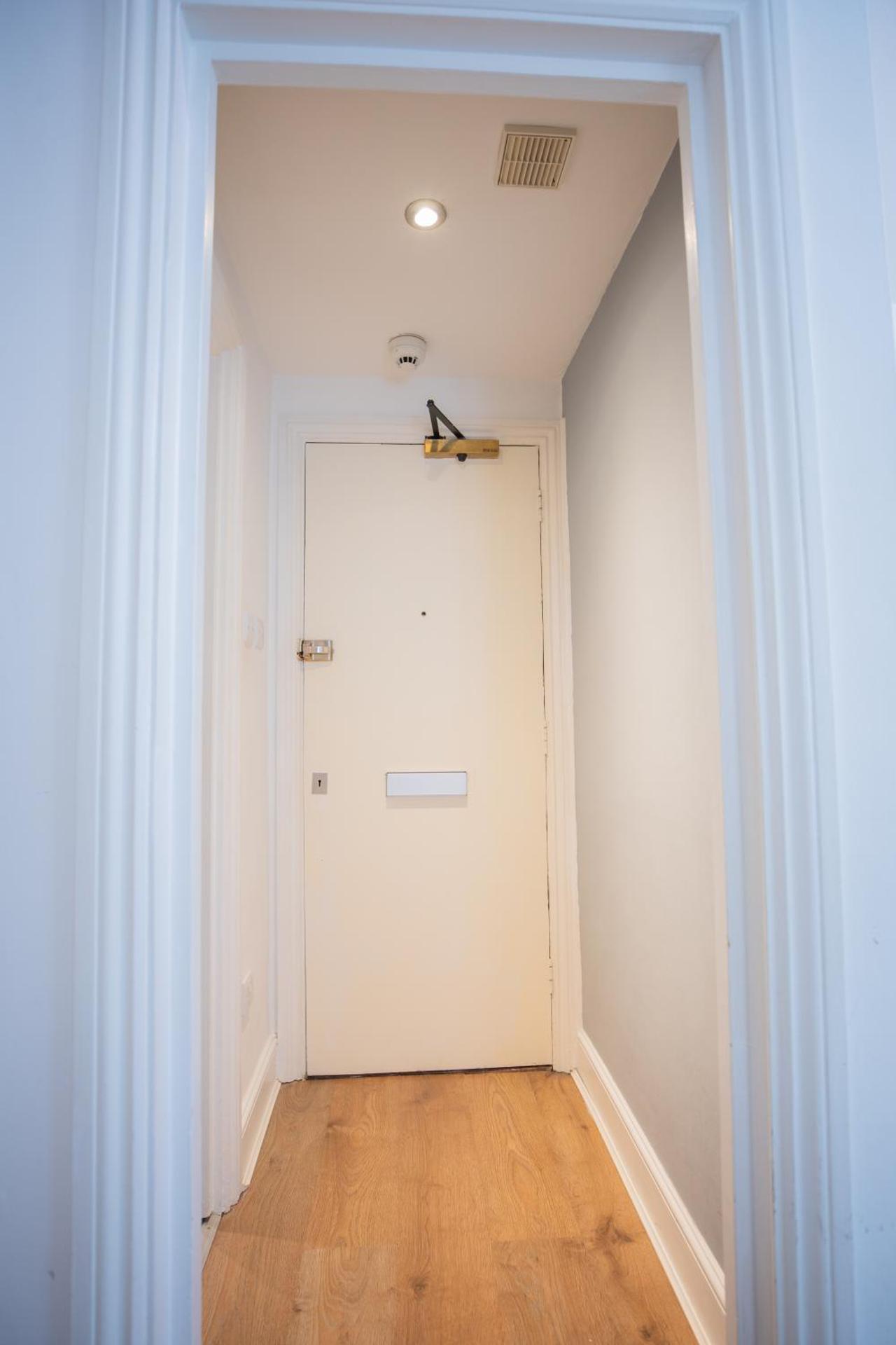 One bedroom at Chelsea cloister Hotel