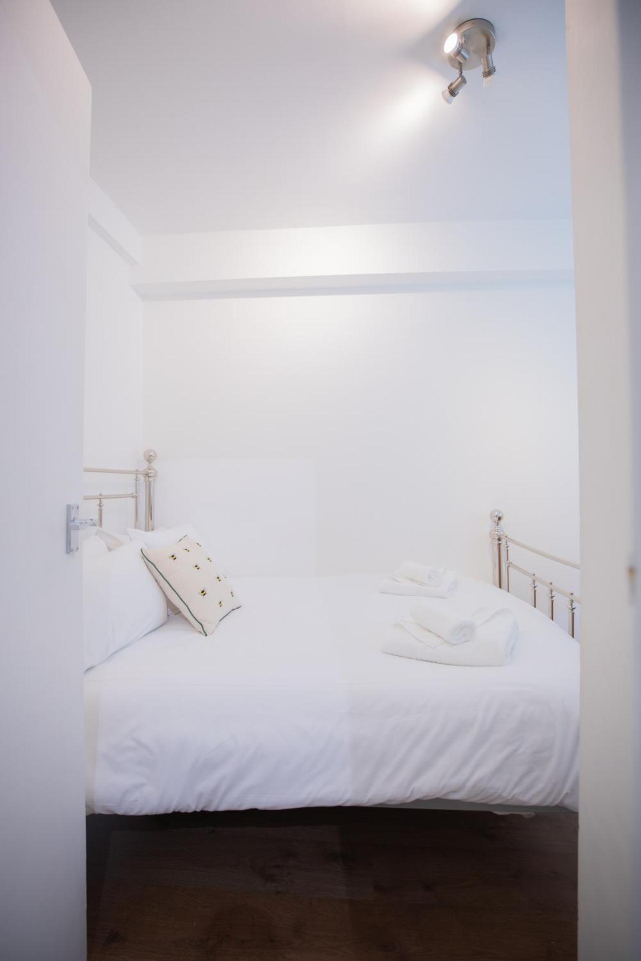 One bedroom at Chelsea cloister Hotel