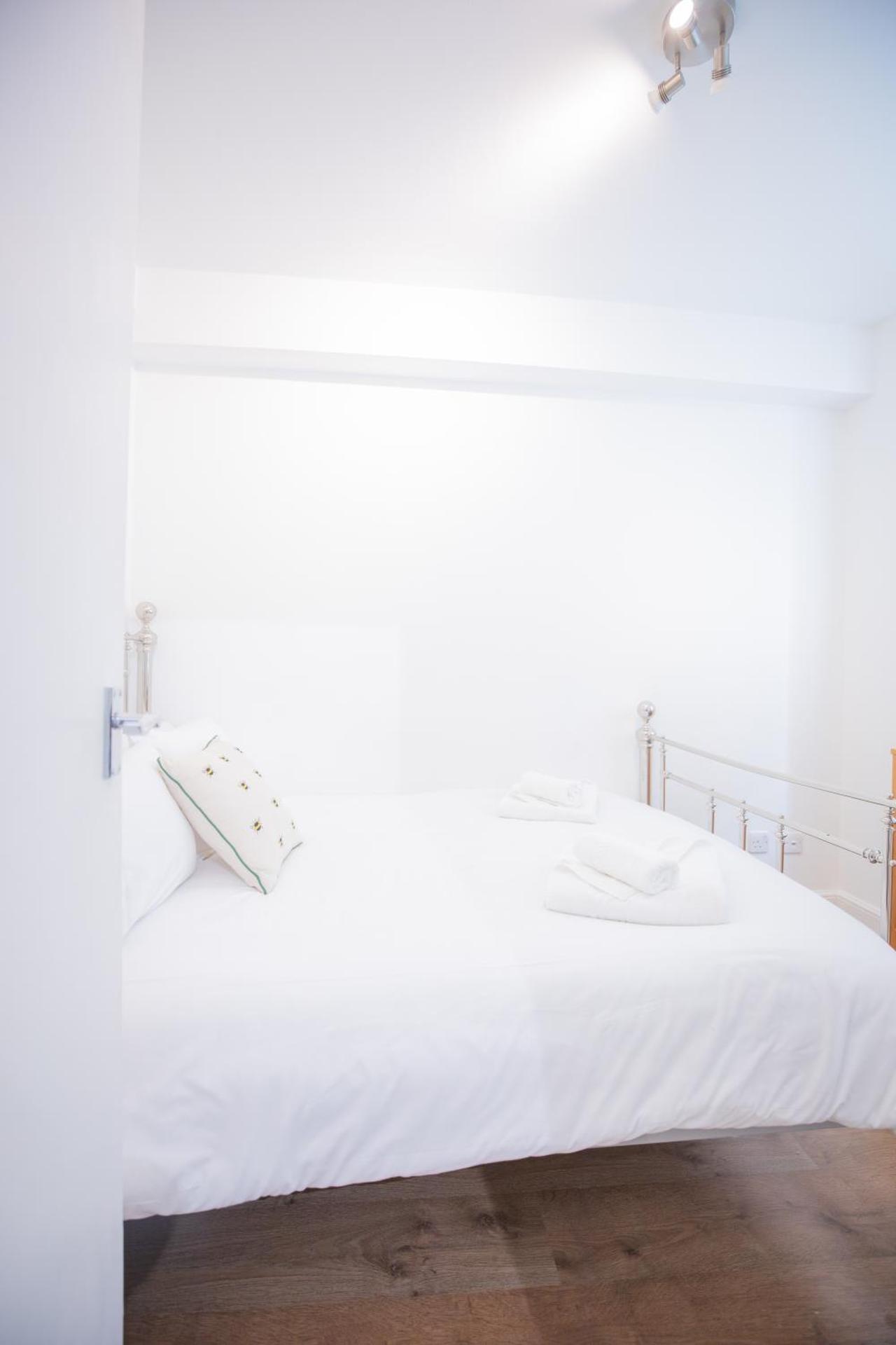 One bedroom at Chelsea cloister Hotel