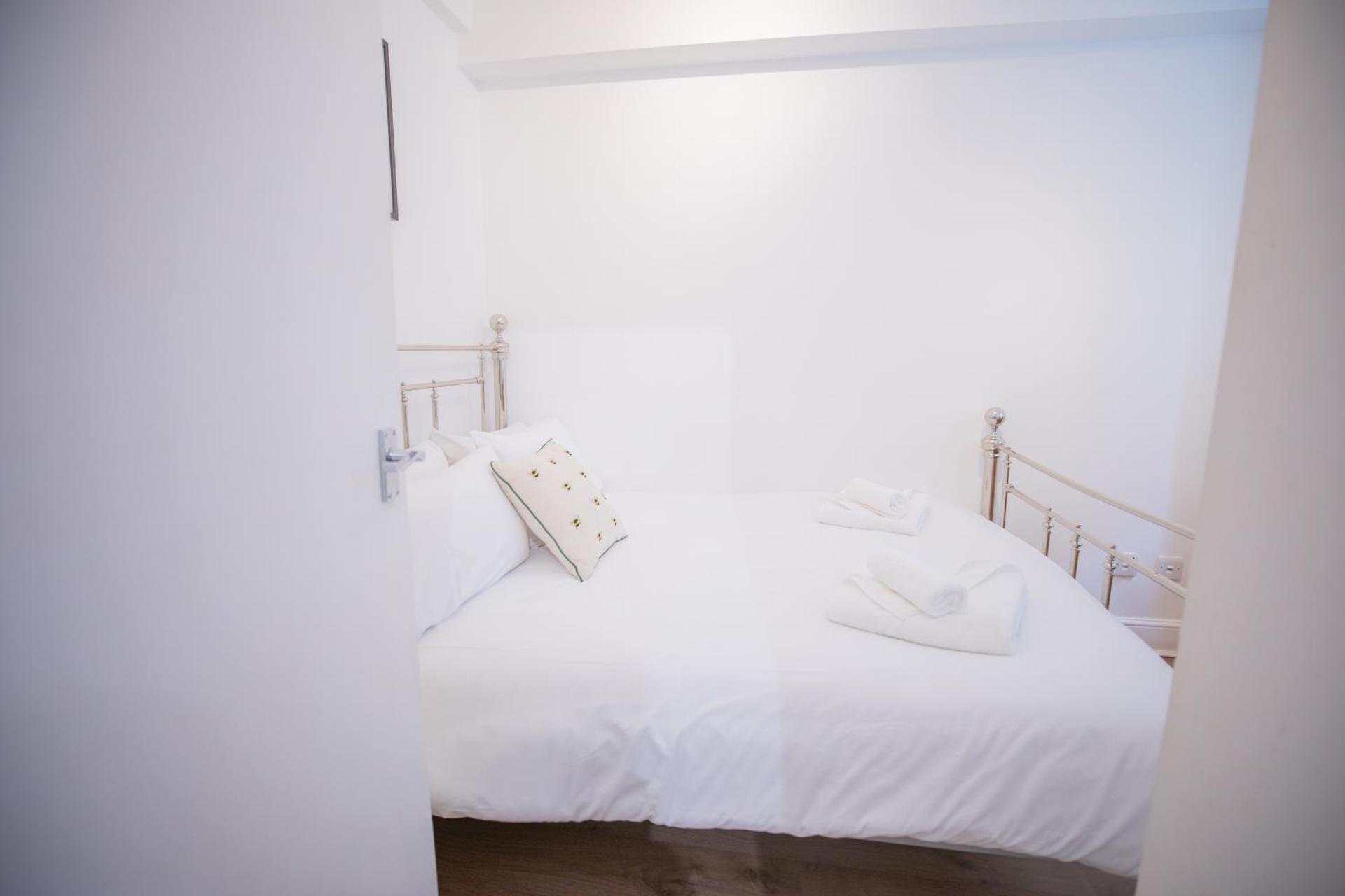 One bedroom at Chelsea cloister Hotel