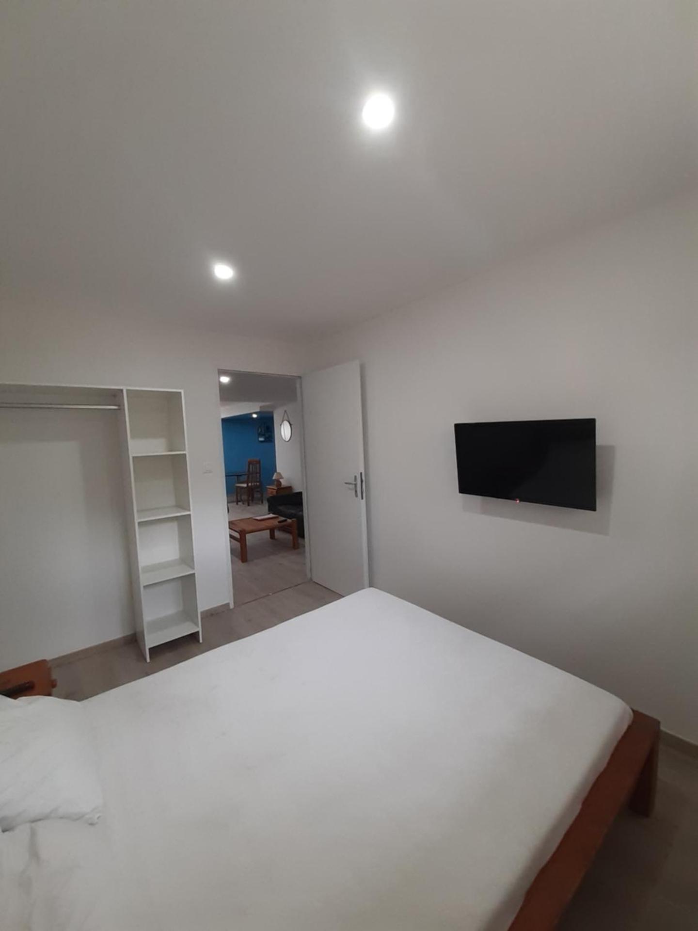 Appartement 50m2 rez de chaussée en plein centre ville garage gratuit