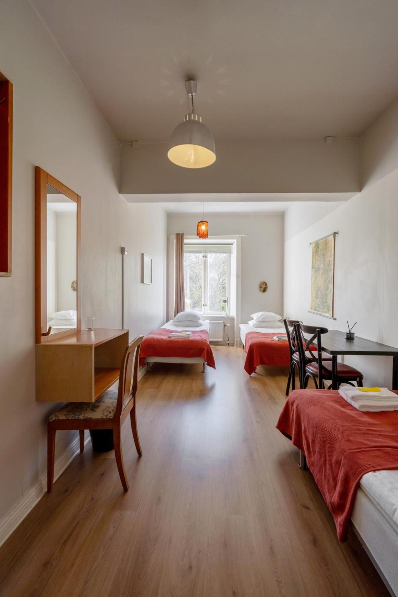 Basic Triple Room with Shared Bathroom (Annex)