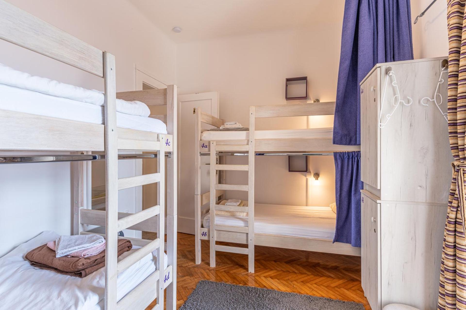 Bed in 4-Bed Mixed Dormitory Room with Balcony and Sea View