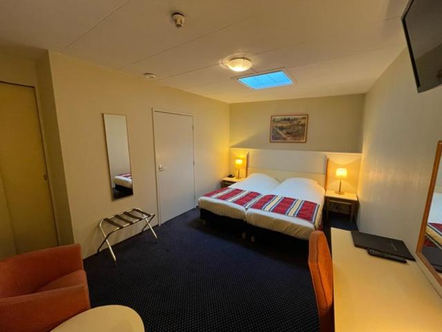 Budget kamer met douche in het souterrain