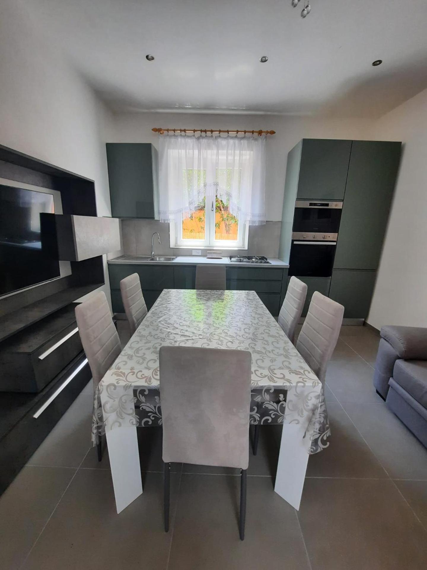 Villa rosa nel cuore di Porto Azzurro