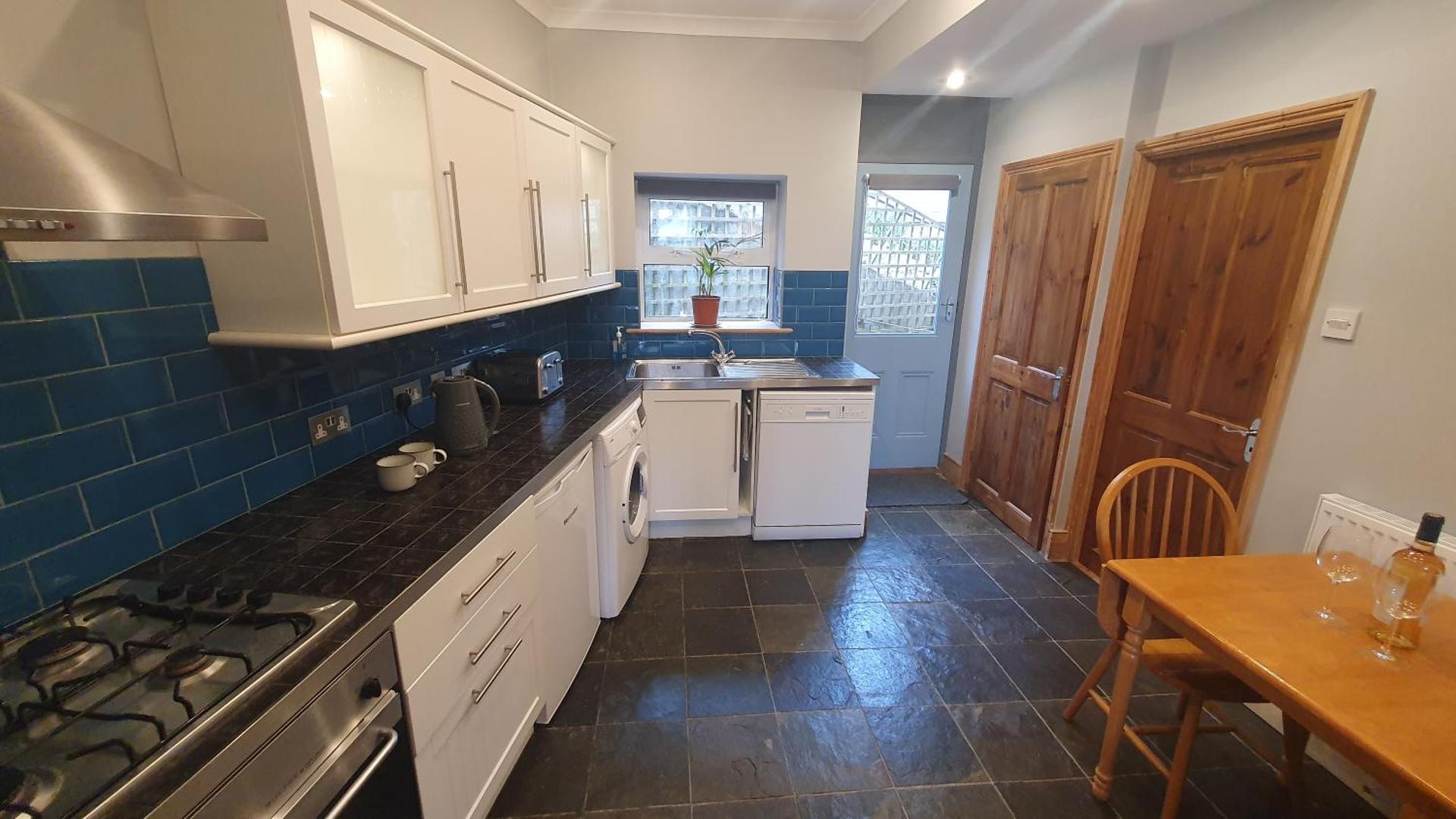 Driftwood in Looe River view and parking