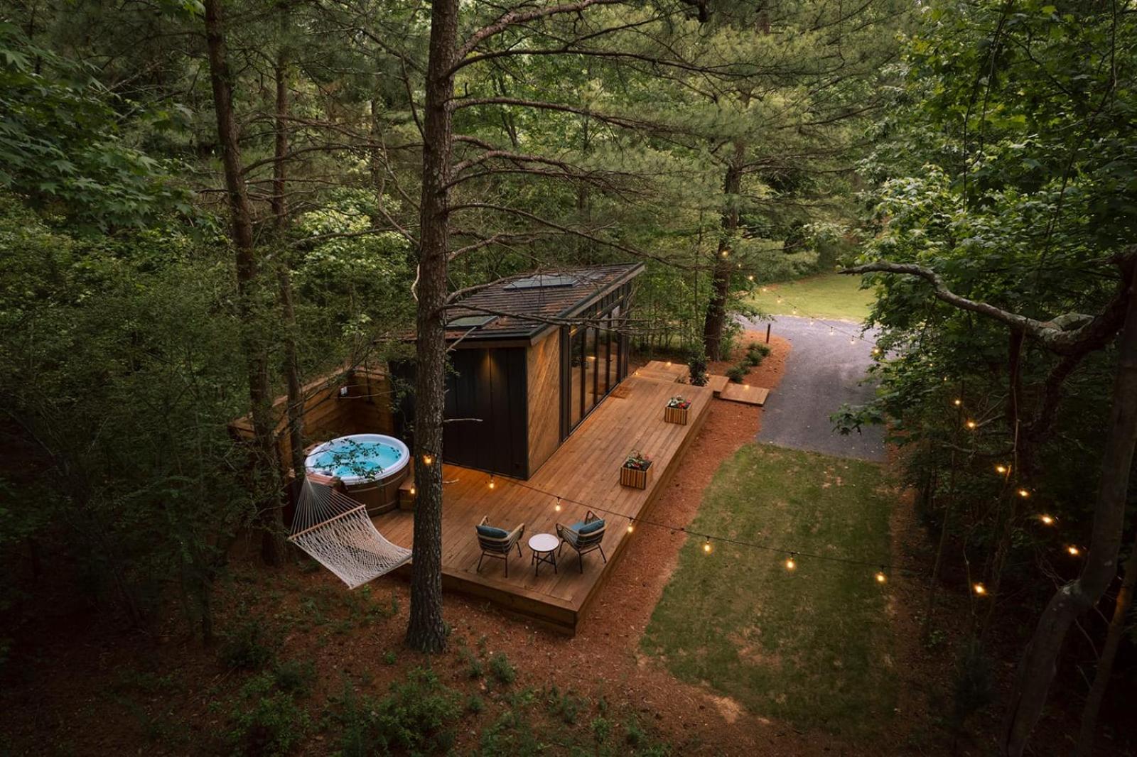 Glamping cottage with glass front and hot tub!